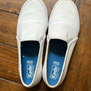 White slip on Keds